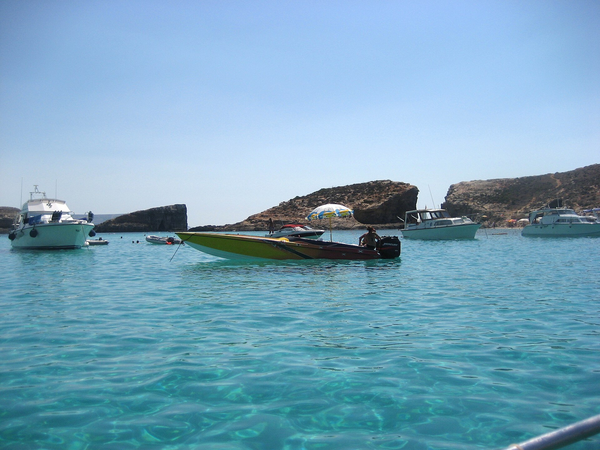 Tour boats moored at the Blue Lagoon, Comino, Malta